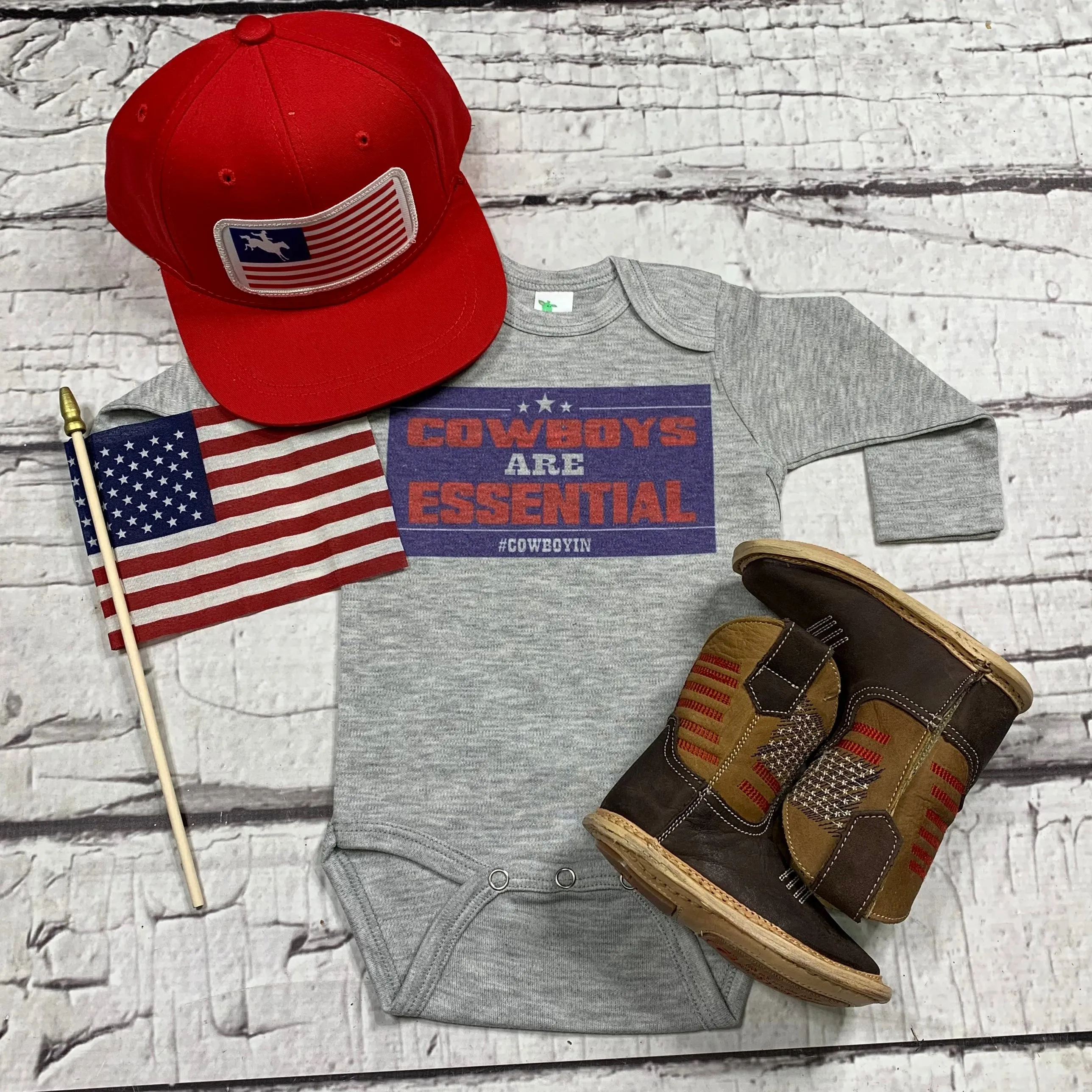 Cowboys are Essential Onesie